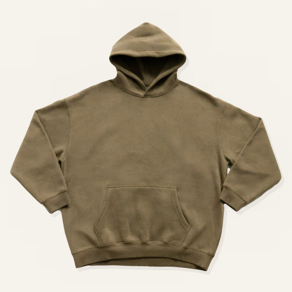 Brown hoodie on a cream background