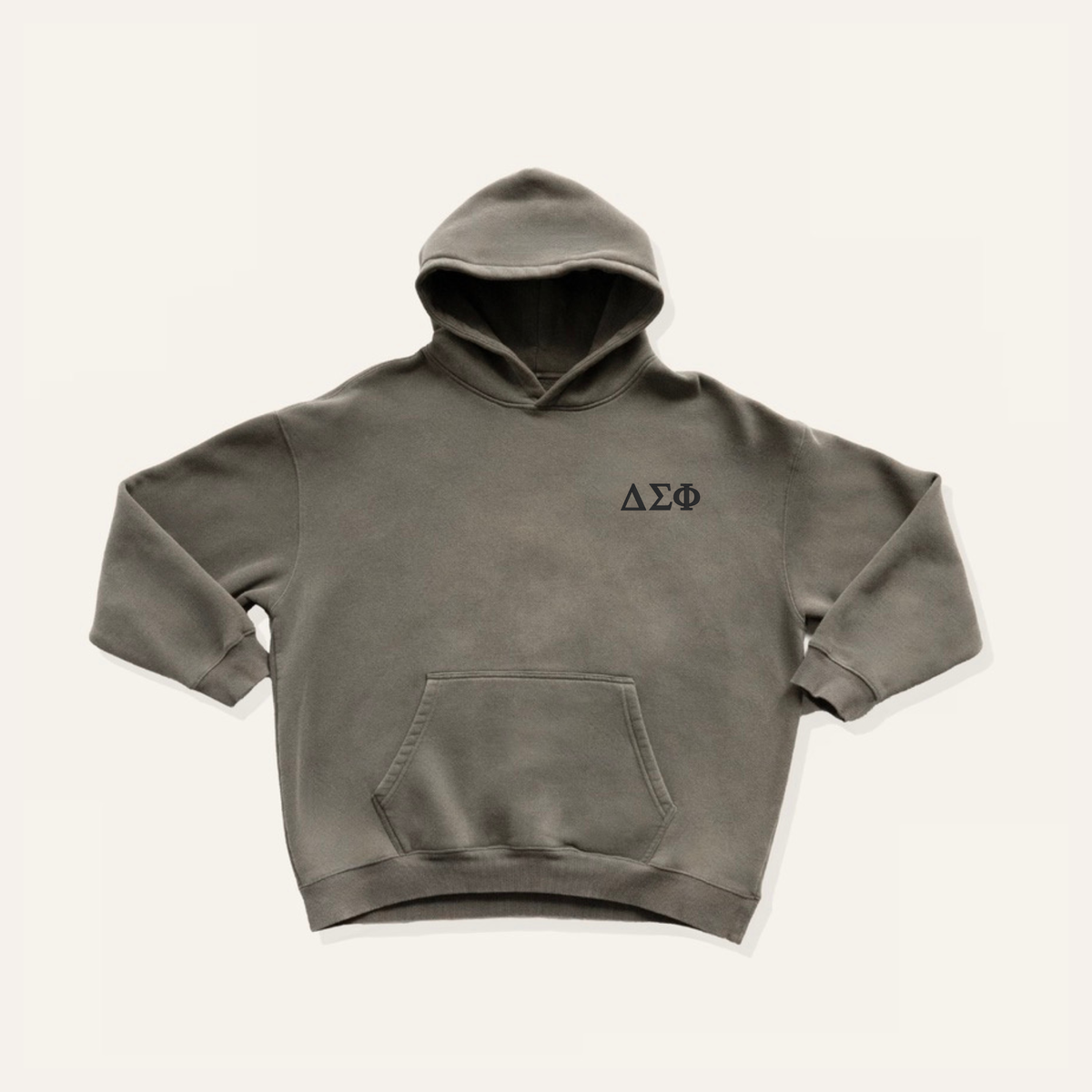 Dark grey hoodie on a cream background with 'Delta Sigma Phi' greek letters in black on the right side chest.